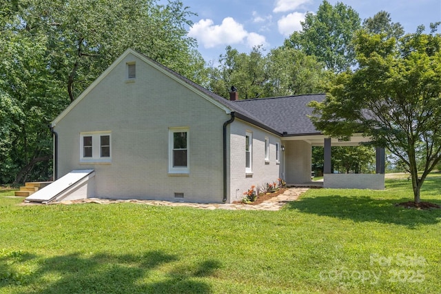 835 Vine Arden Rd, Morganton, NC 28655 - rear view of house featuring brick siding, a lawn, crawl space, and a shingled roof