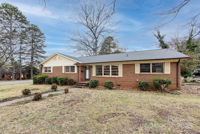 4601 Mendham Dr, Charlotte, NC 28215 - single story home featuring brick siding, a front yard, and roof with shingles