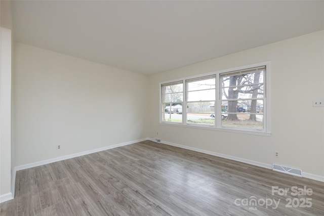 4601 Mendham Dr, Charlotte, NC 28215 - empty room featuring wood finished floors
