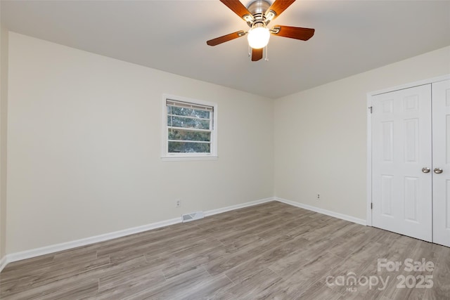 4601 Mendham Dr, Charlotte, NC 28215 - unfurnished room with light wood-style floors and ceiling fan