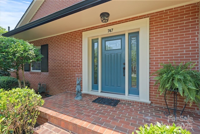 747 9th St NW, Hickory, NC 28601 - doorway to property with brick siding
