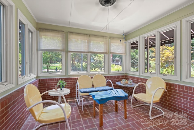 747 9th St NW, Hickory, NC 28601 - sunroom / solarium with brick patterned floors, plenty of natural light, and ornamental molding