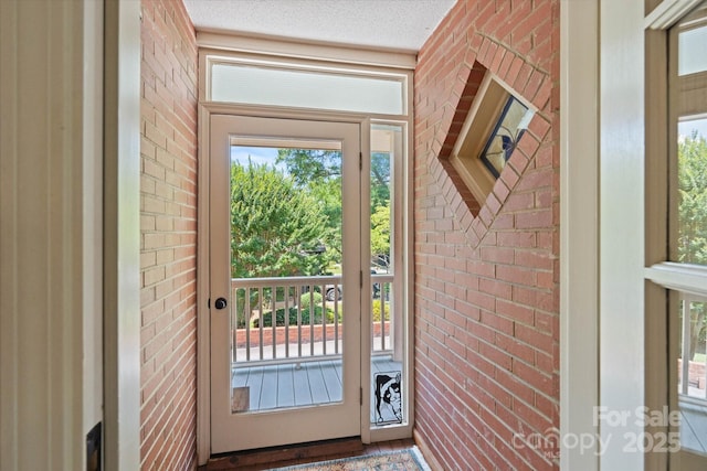 747 9th St NW, Hickory, NC 28601 - doorway to outside featuring brick wall