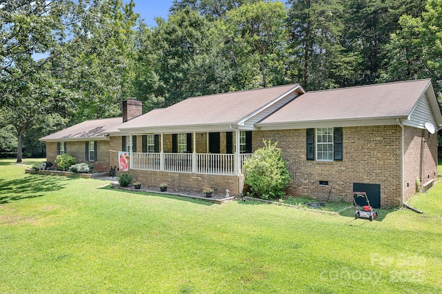 6601 Charlotte Hwy, York, SC 29745 - ranch-style house with brick siding, a front yard, a chimney, and crawl space