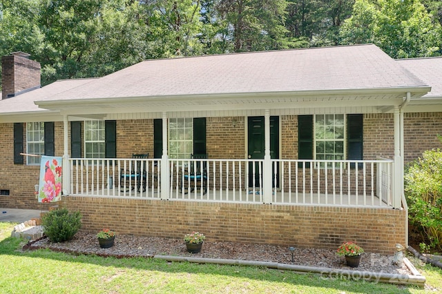 6601 Charlotte Hwy, York, SC 29745 - ranch-style house with a porch and brick siding