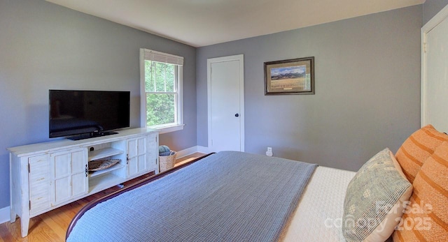 207 Buncombe St, Hendersonville, NC 28739 - bedroom featuring wood finished floors and baseboards