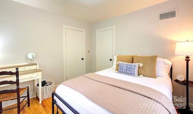 207 Buncombe St, Hendersonville, NC 28739 - bedroom featuring light wood-style flooring and baseboards