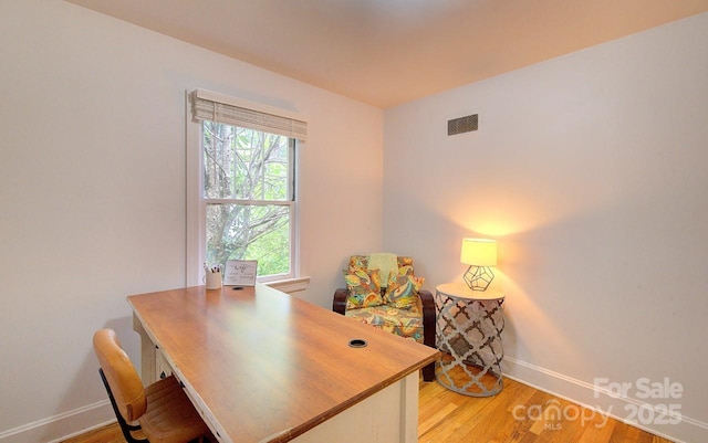 207 Buncombe St, Hendersonville, NC 28739 - office area featuring baseboards and light wood-style flooring