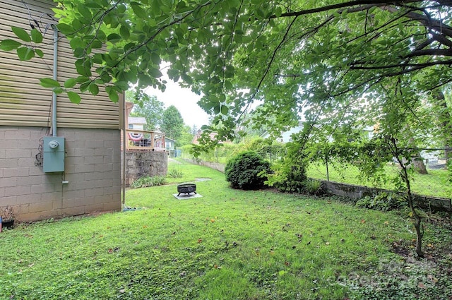 207 Buncombe St, Hendersonville, NC 28739 - view of yard featuring an outdoor fire pit