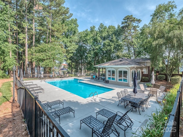 17709 Sedona Way, Cornelius, NC 28031 - community pool featuring a patio area and view of scattered trees