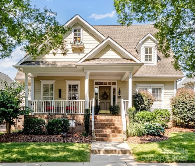 5572 Yorke St NW, Concord, NC 28027 - view of front facade with roof with shingles and covered porch