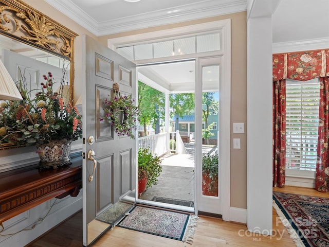 5572 Yorke St NW, Concord, NC 28027 - entryway with plenty of natural light, wood finished floors, and crown molding