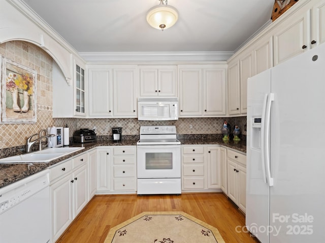 5572 Yorke St NW, Concord, NC 28027 - kitchen featuring white appliances, light wood-style floors, tasteful backsplash, glass insert cabinets, and white cabinetry