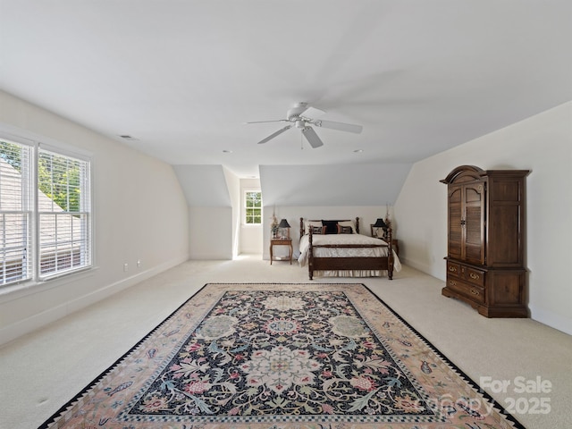 5572 Yorke St NW, Concord, NC 28027 - bedroom featuring carpet, vaulted ceiling, multiple windows, and ceiling fan