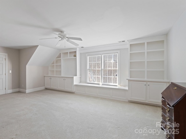 5572 Yorke St NW, Concord, NC 28027 - bonus room with light colored carpet, a ceiling fan, and built in shelves