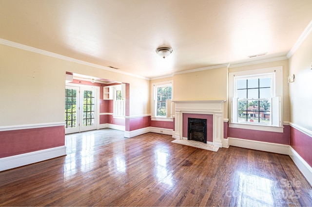 1010 College Ave SW, Lenoir, NC 28645 - unfurnished living room featuring wood finished floors, a fireplace with flush hearth, and crown molding