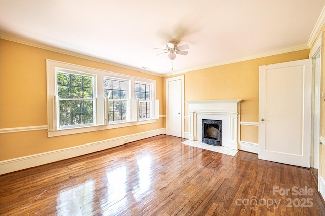 1010 College Ave SW, Lenoir, NC 28645 - unfurnished living room with ceiling fan, wood finished floors, crown molding, and a fireplace with flush hearth