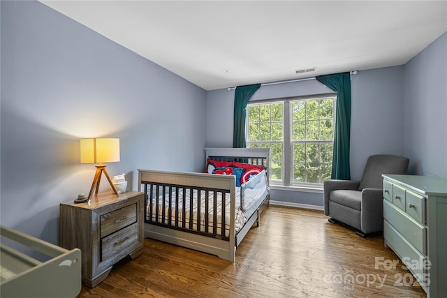6800 Augustine Way, Charlotte, NC 28270 - bedroom with wood finished floors and baseboards
