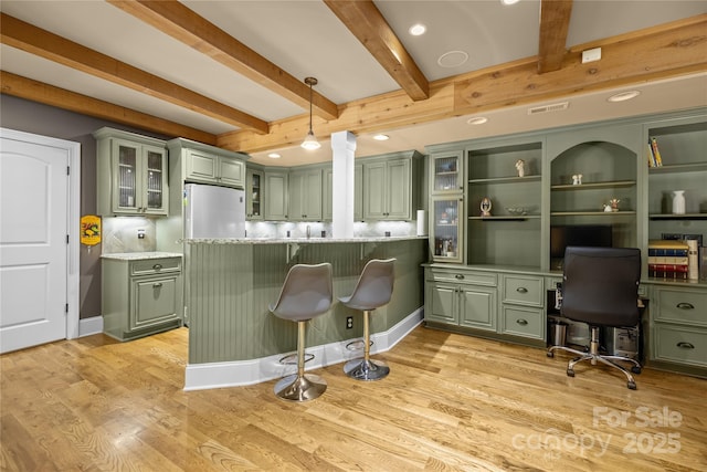6800 Augustine Way, Charlotte, NC 28270 - kitchen with green cabinets, a peninsula, beam ceiling, and built in study area
