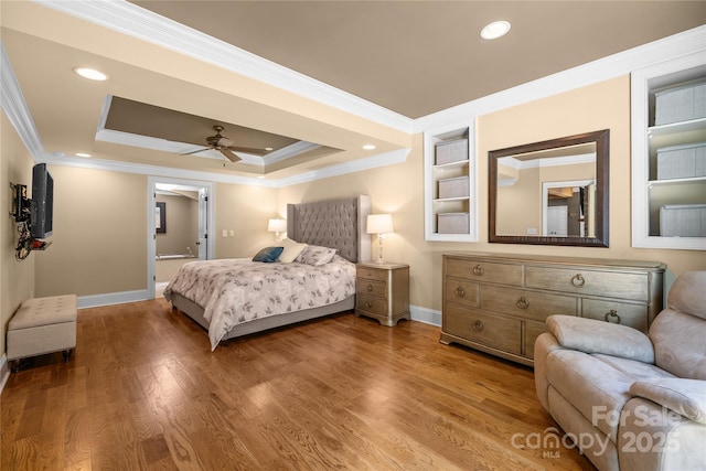 6800 Augustine Way, Charlotte, NC 28270 - bedroom featuring crown molding, recessed lighting, a raised ceiling, wood finished floors, and ceiling fan