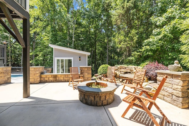 6800 Augustine Way, Charlotte, NC 28270 - view of patio with a fire pit, an outbuilding, and an outdoor pool