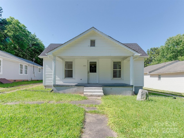 2414 Lane St, Kannapolis, NC 28083 - bungalow featuring a porch, roof with shingles, and a front yard