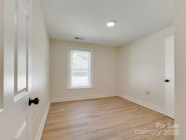 2414 Lane St, Kannapolis, NC 28083 - spare room featuring light wood-style floors and baseboards
