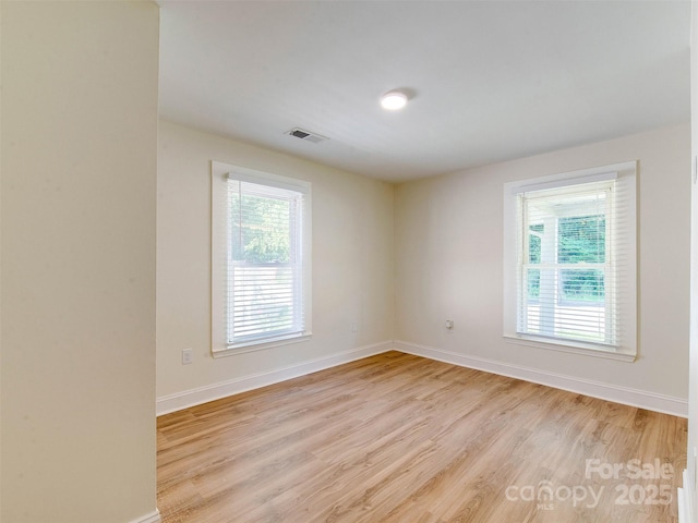 2414 Lane St, Kannapolis, NC 28083 - empty room featuring light wood-style floors