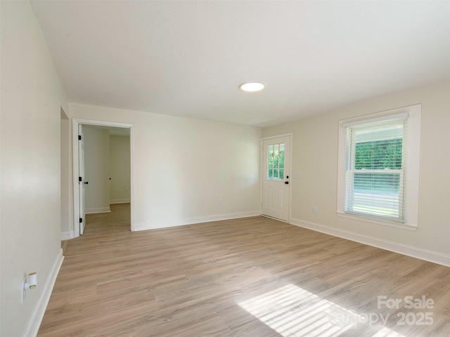 2414 Lane St, Kannapolis, NC 28083 - unfurnished room with light wood-style floors and baseboards