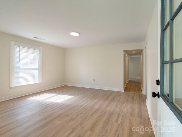 2414 Lane St, Kannapolis, NC 28083 - spare room with light wood-type flooring and baseboards