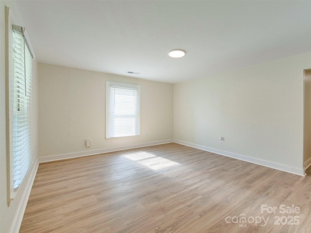 2414 Lane St, Kannapolis, NC 28083 - empty room with light wood-style flooring and baseboards