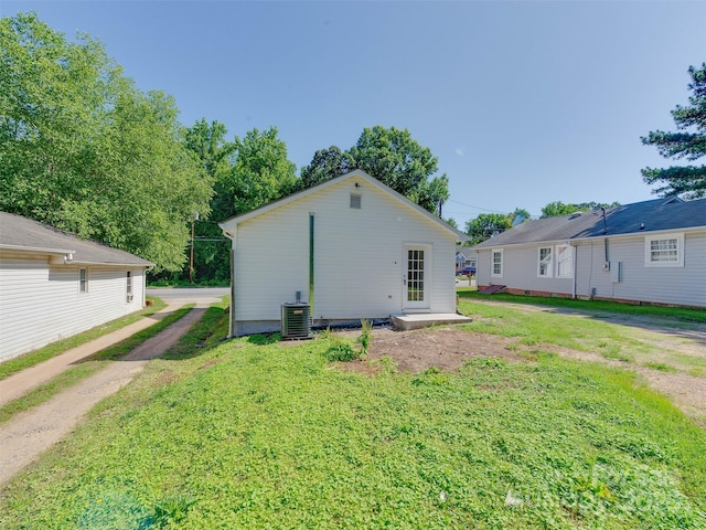 2414 Lane St, Kannapolis, NC 28083 - view of side of home featuring a central air condition unit and a yard