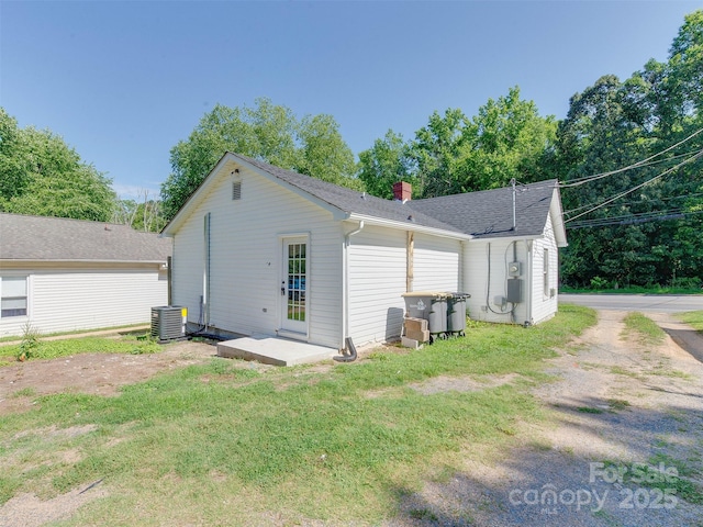 2414 Lane St, Kannapolis, NC 28083 - rear view of property with a chimney and a lawn