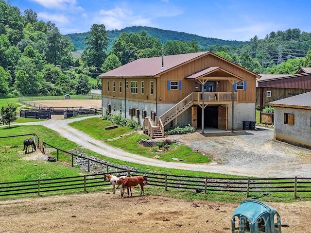 442 Blantyre Church Rd, Horse Shoe, NC 28742 - back of property with driveway, a view of countryside, a mountain view, and stairs