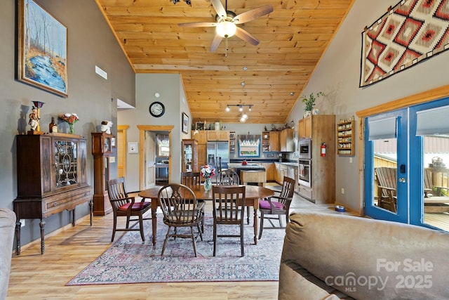 442 Blantyre Church Rd, Horse Shoe, NC 28742 - dining space with high vaulted ceiling, wood ceiling, light wood finished floors, and ceiling fan