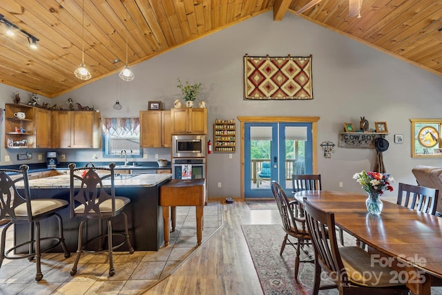 442 Blantyre Church Rd, Horse Shoe, NC 28742 - kitchen with appliances with stainless steel finishes, wooden ceiling, light wood-style floors, open shelves, and brown cabinets