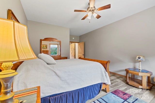 442 Blantyre Church Rd, Horse Shoe, NC 28742 - bedroom with wood finished floors and ceiling fan