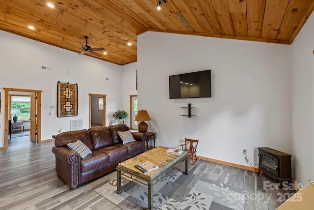 442 Blantyre Church Rd, Horse Shoe, NC 28742 - living area featuring a wood stove, wood ceiling, ceiling fan, light wood-type flooring, and recessed lighting
