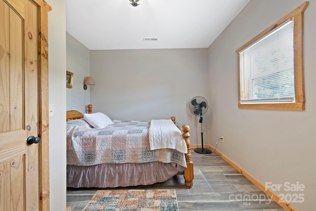 442 Blantyre Church Rd, Horse Shoe, NC 28742 - bedroom with wood finished floors and baseboards