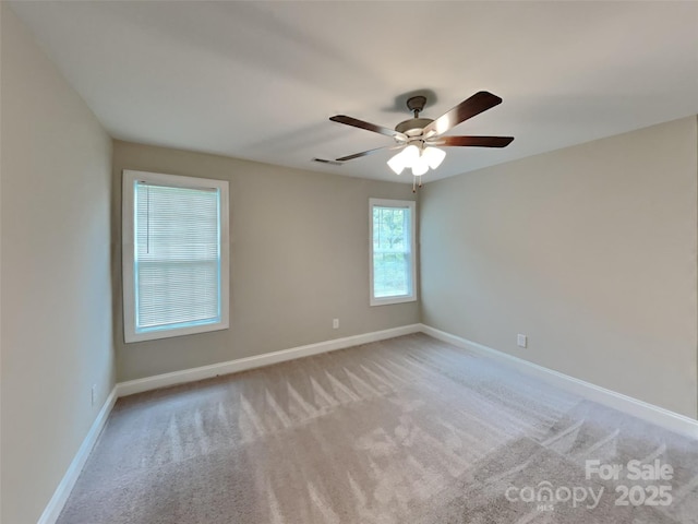 115 Dove Ave SW, Concord, NC 28025 - spare room with light carpet and ceiling fan