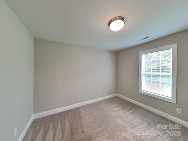 115 Dove Ave SW, Concord, NC 28025 - carpeted spare room featuring baseboards