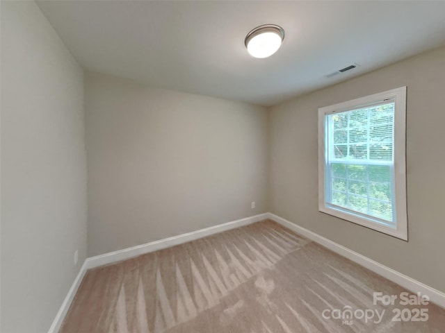 115 Dove Ave SW, Concord, NC 28025 - empty room with baseboards and light carpet