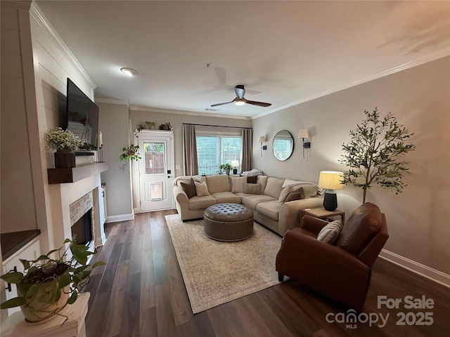 1013 Park W Dr Unit 5, Charlotte, NC 28209 - living area featuring dark wood-type flooring, a ceiling fan, a fireplace, and crown molding