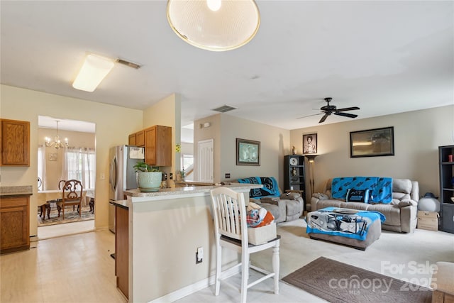 11440 Lamoille Ln, Charlotte, NC 28278 - living area with a chandelier and ceiling fan