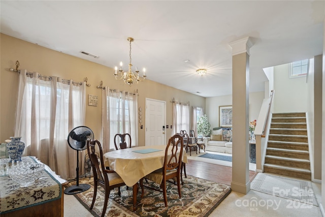 11440 Lamoille Ln, Charlotte, NC 28278 - dining room with stairway and a chandelier