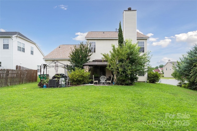 11440 Lamoille Ln, Charlotte, NC 28278 - back of property featuring a gazebo, a chimney, and roof with shingles
