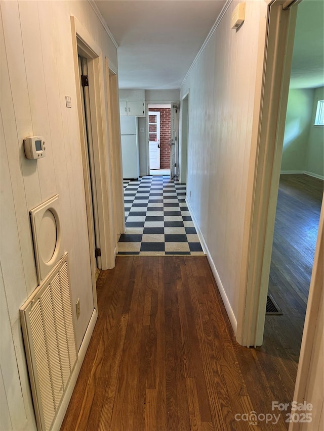 1239 8th St NE, Hickory, NC 28601 - hallway with dark wood-style flooring and crown molding