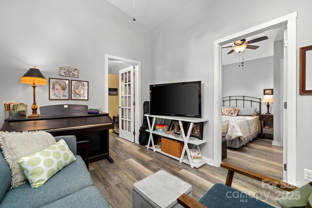 211 Summer St, Swannanoa, NC 28778 - living room featuring ceiling fan, wood finished floors, and vaulted ceiling