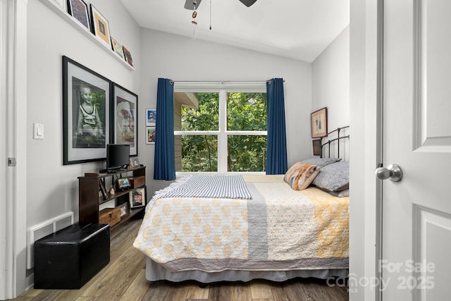 211 Summer St, Swannanoa, NC 28778 - bedroom featuring vaulted ceiling, wood finished floors, and a ceiling fan