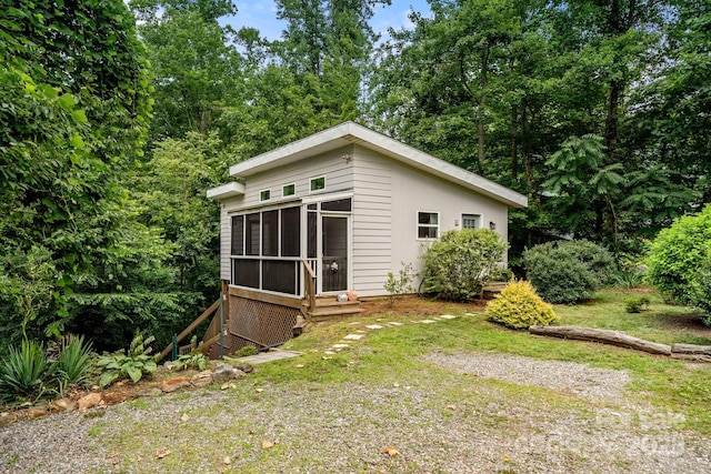 211 Summer St, Swannanoa, NC 28778 - view of property exterior featuring a sunroom